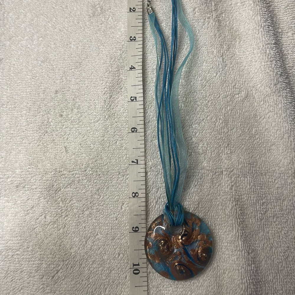 Blue and Gold Multi-Strand Necklace with Decorative Pendant